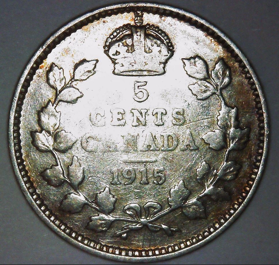 1900-Round-0-And-1915-Five-Cents