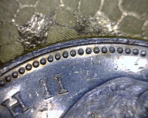 1966-Large-Or-Small-Bead-Canadian-Loonie?