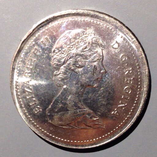 1985-Nickel-Dollar-Error,-Off-Center,-Missing-Reeded-Edge