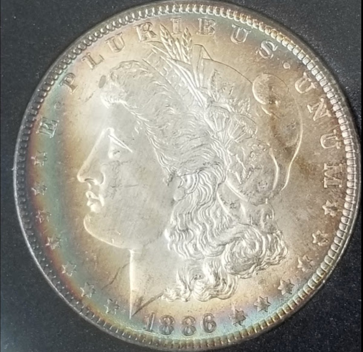 1886-Morgan-For-Grading.-A-Bit-Of-Rainbow-Toning.