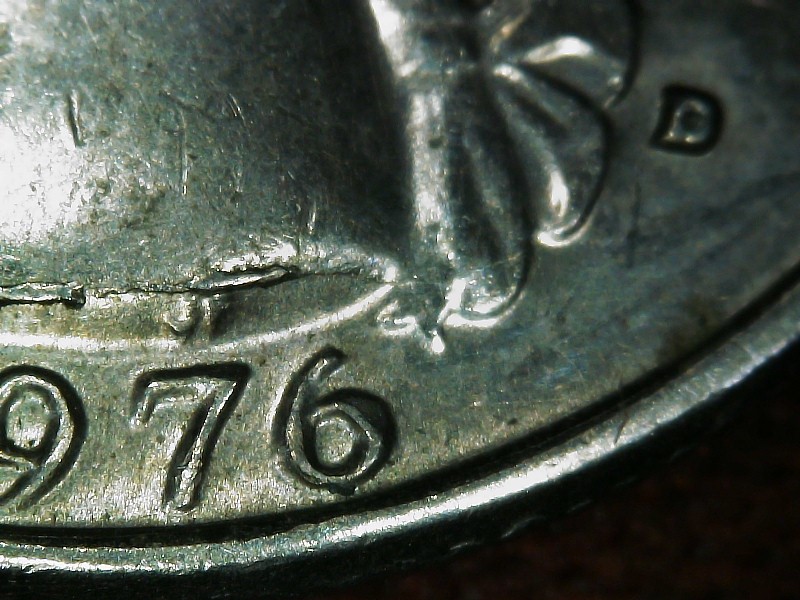1976-Bicentennial-Quarter-Die-Break-Obverse?