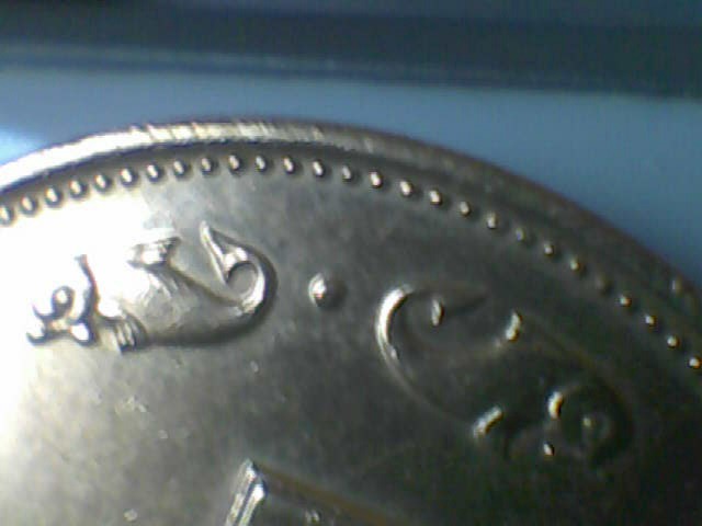 A-Coin-Or-Button-?-Symbols-Around-The-Edges...please-Help-X