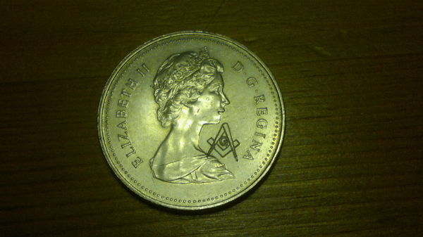 Strange-Engraving-On-Nickel-Dollar...?
