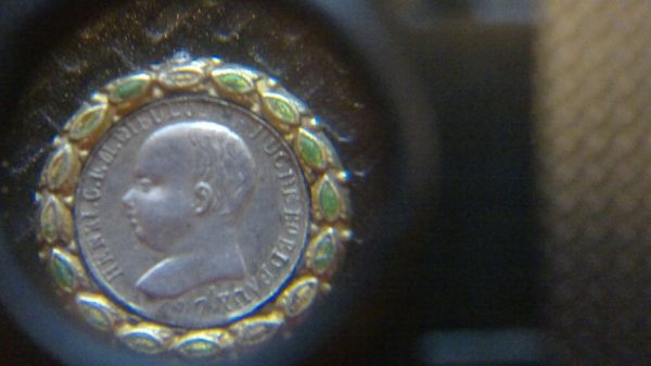 Smallest-Coin-In-My-Collection.-So-Small-I-Can't-Read-It...