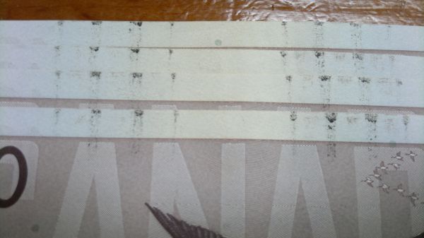 Bank-Notes-With-Streaking-Ink...