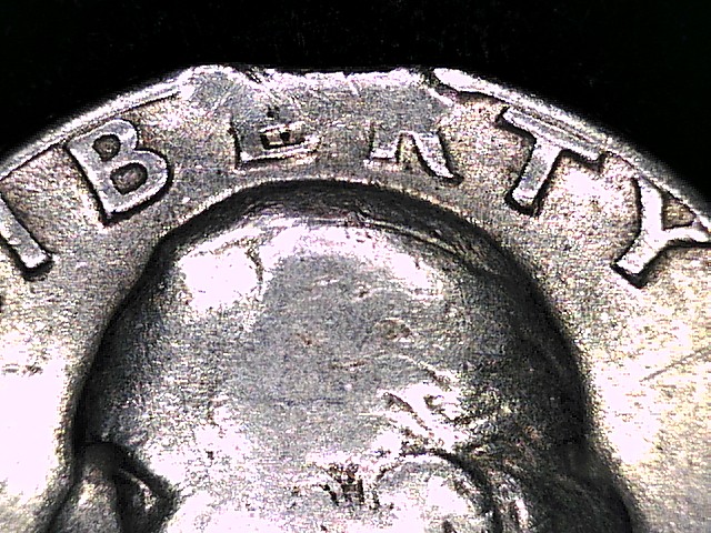 1965-Washington-Quarter-Clipped-+-Possible-Blakesley-Effect