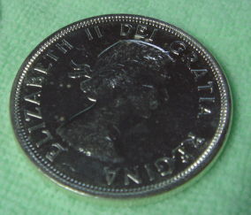 1964-Dollar-KM#58---Difference-Between-Specimen-Proof-And-Business-Strike?
