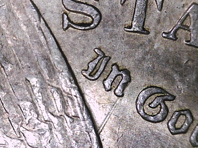 1889-O-Morgan-Dollar-Spiked-Wing?....vam?