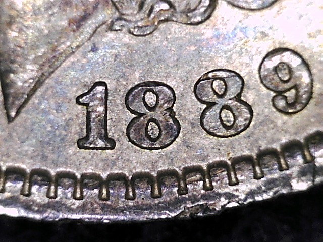 1889-O-Morgan-Dollar-Spiked-Wing?....vam?