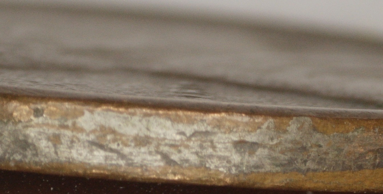A-Fun-Magician's-Coin---1945/57-Philadenver-Lincoln-Cent