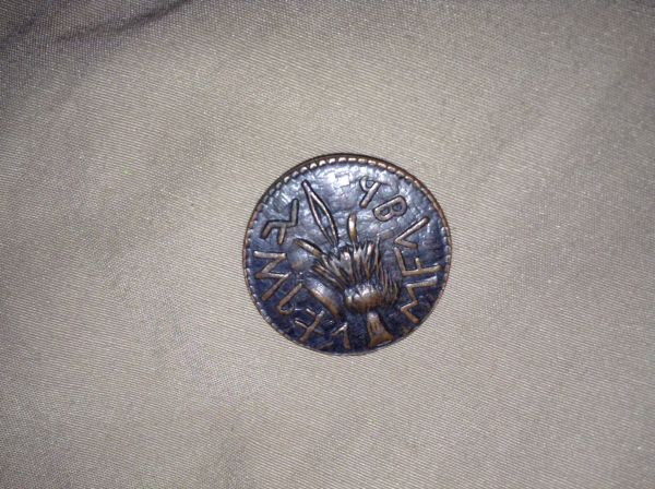 Really-Old-Weird-Coin-With-Broom-On-It