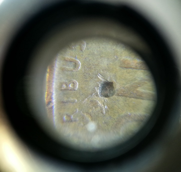 1950-S-Penny-With-Ruptured-Gas-Bubble,-Blow-Hole,-Or-PMD?