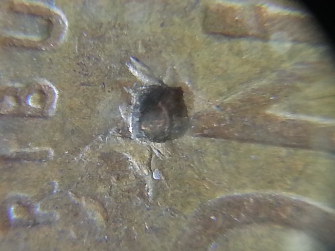 1950-S-Penny-With-Ruptured-Gas-Bubble,-Blow-Hole,-Or-PMD?