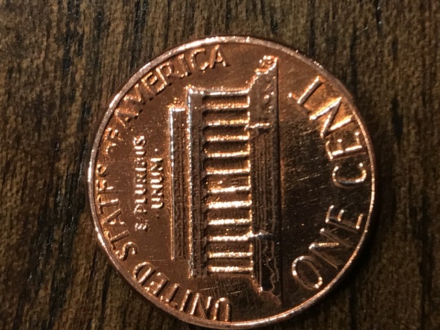 1985-D-Penny-Missing-Lower-Half-Of-