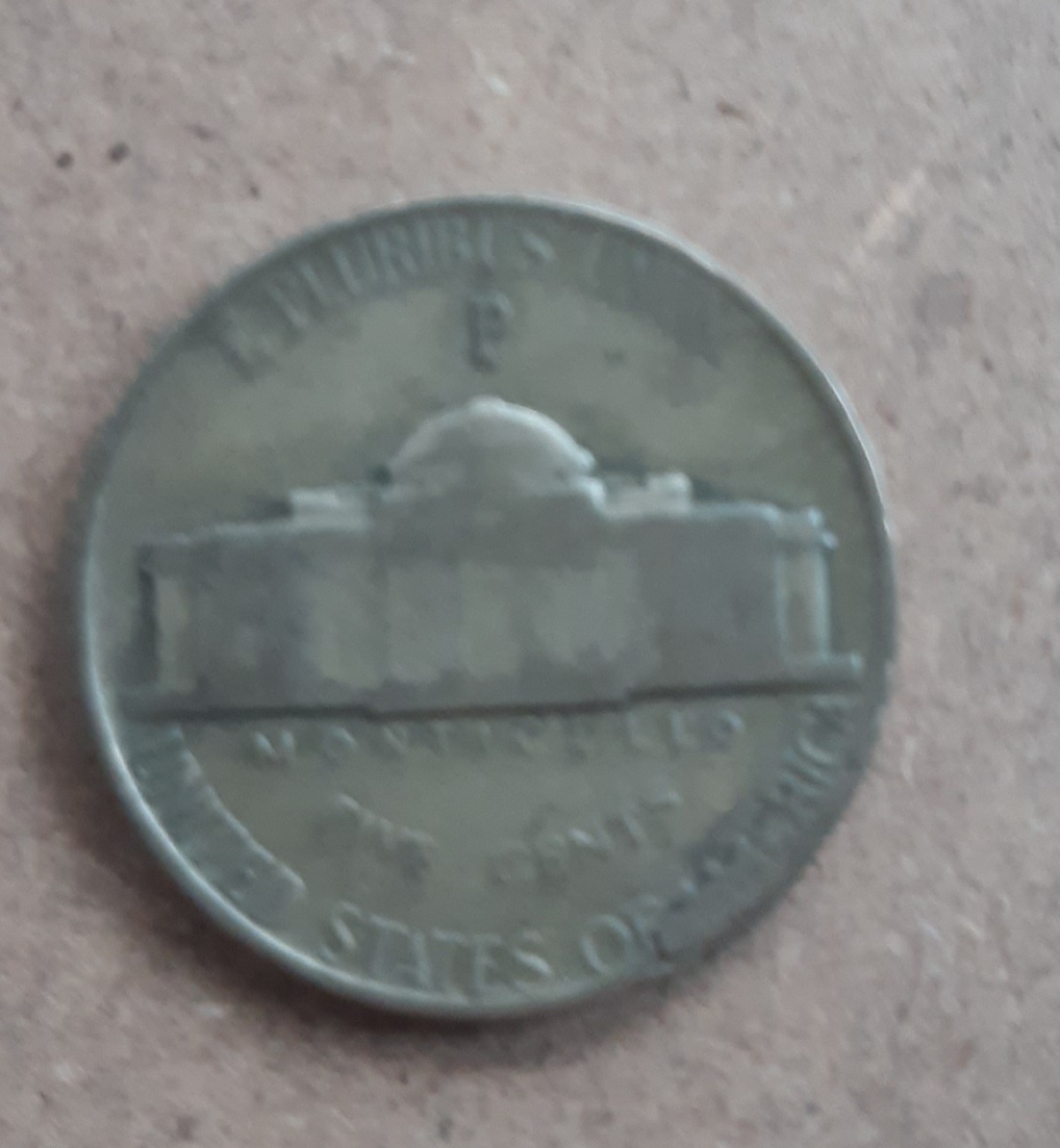 1943-P-Jefferson-War-Nickel-Error-Or-PMD?