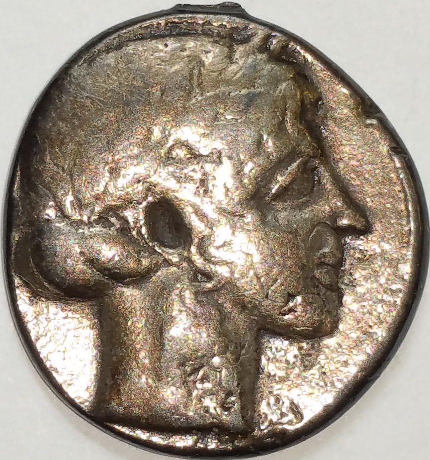 Coin:-One-Side-Mans-Head-/-Other-Side-Lions-Head