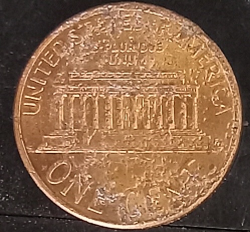 Found-2000-D-Pennies-With-Reverse-Over-Obverse