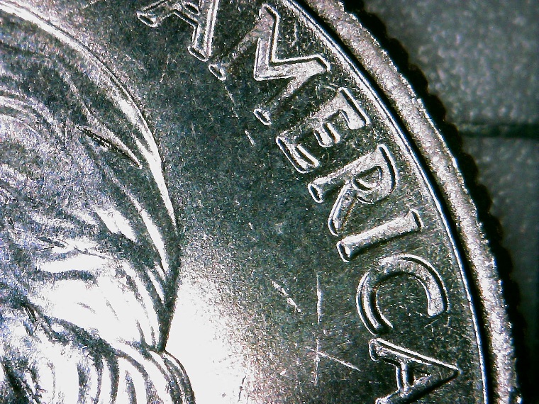 2020-D-Quarter----Die-Deterioration-/Struck-Through-Grease-Along-Edge?