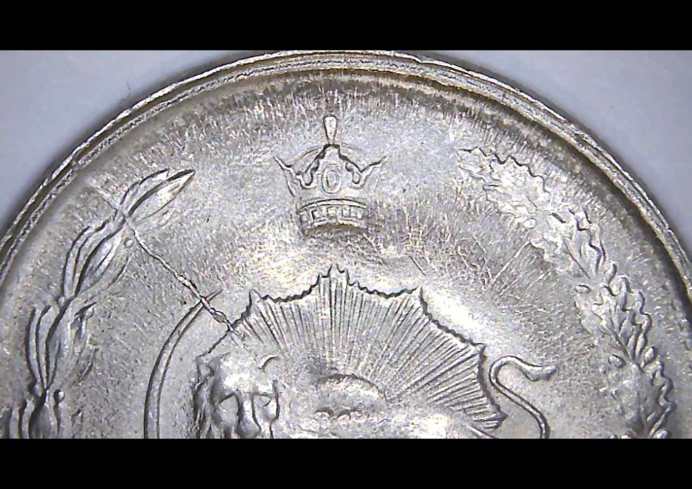 1976-2-Rial-50th-Anniversary---Large-Die-Crack-And-Maybe-Something-Else?