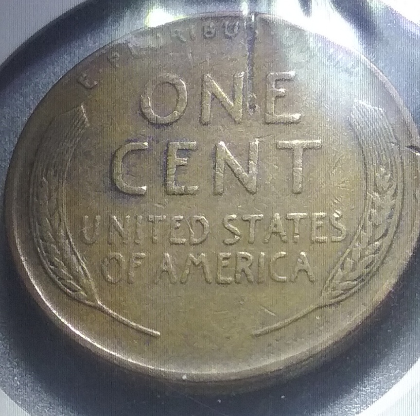 1945-P-Wheat-Penny-Struck-With-Looks-Like-A-Staple-It-Rapped-Around-The-Rim-Of-The-Coin