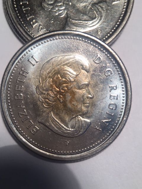 Canada-25-Cents-2003-P-Plating-Error-Or-PMD