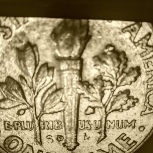 Weird-Markings-On-A-1964-Dime