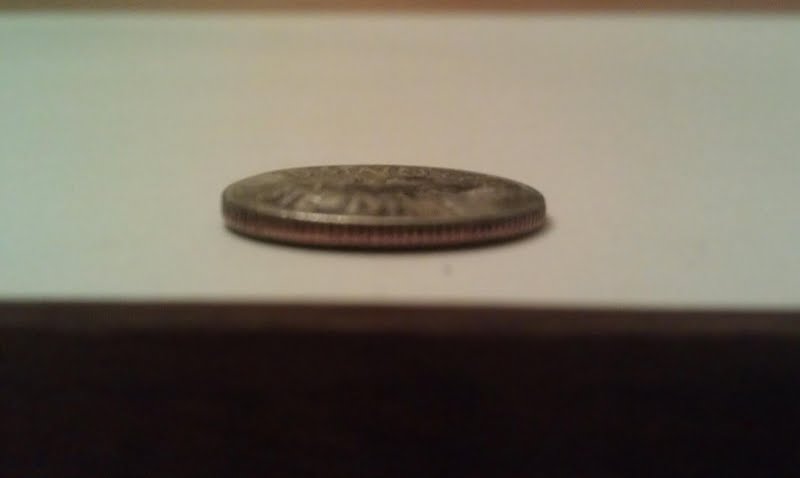 Why-Is-This-Dime-The-Way-It-Is?