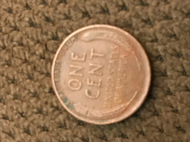 1949-Penny-With-Blob-Of-Copper-Under-Date
