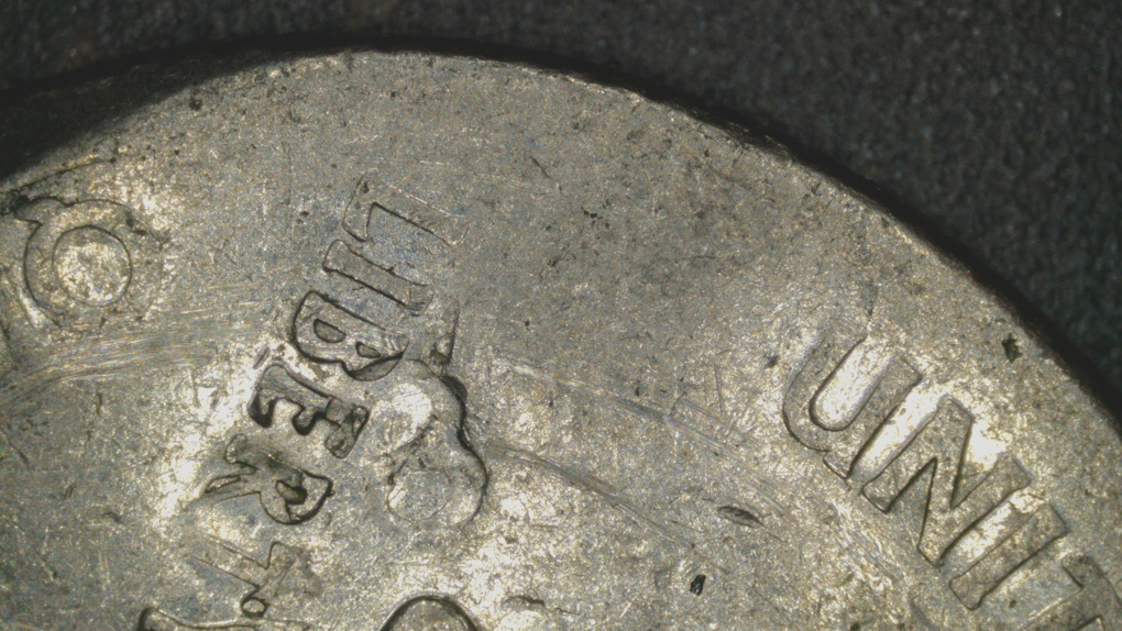2001-D-Rhode-Island-State-Quarter-Error-Or-PMD?