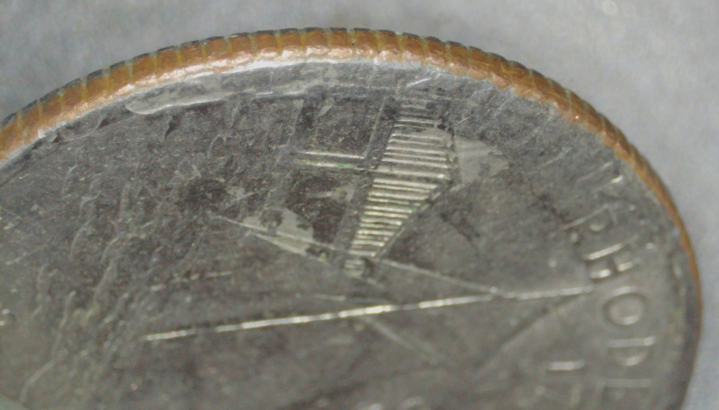 2001-D-Rhode-Island-State-Quarter-Error-Or-PMD?