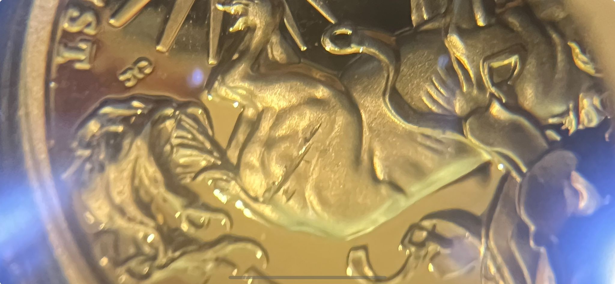 Is-This-?-2021-W-American-Liberty-High-Relief-Gold-Coin---Strike-Thru-Mint-Error?