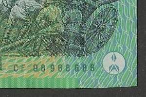 Does-Your-$100-Cf98-Have-An-Odd-Cut-Bottom-Right-Corner?