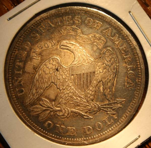 Grade-And-Value-For-1866-Seated-Dollar-With-Motto