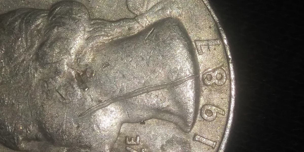 1987-D-Washington-Quarter-Error-Or-Just-Damaged?