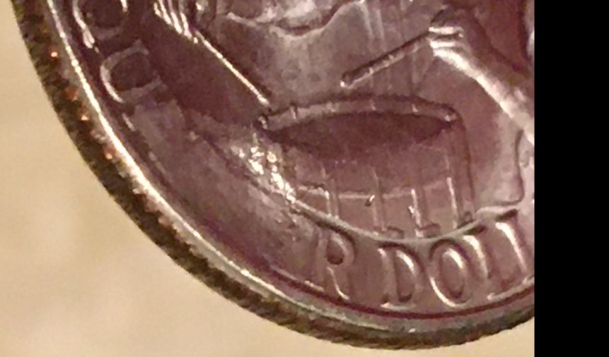 Possible-Grease-Filled-Die,-Bicentennial-Quarter