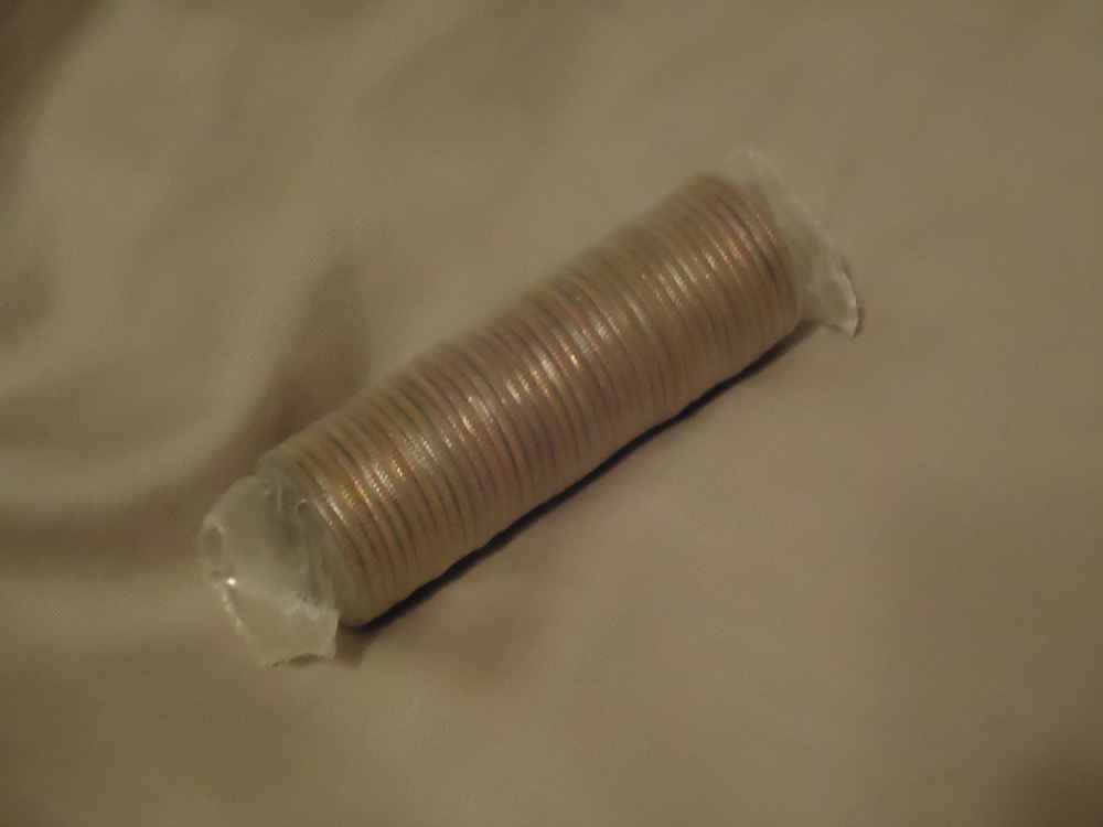 Open-Old-Roll-Of-Quarters?