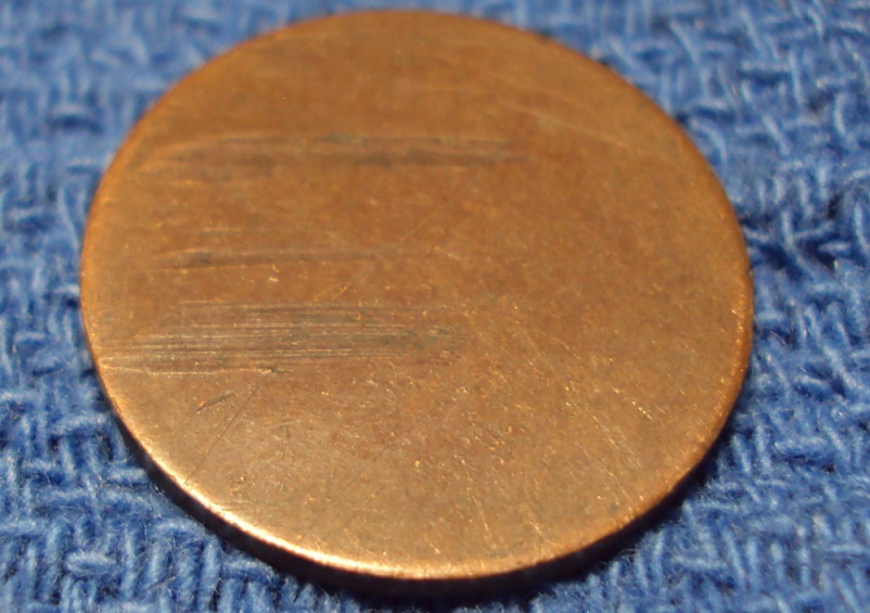 Copper-Blank-Planchet-Found-In-Bank-Cent-Roll