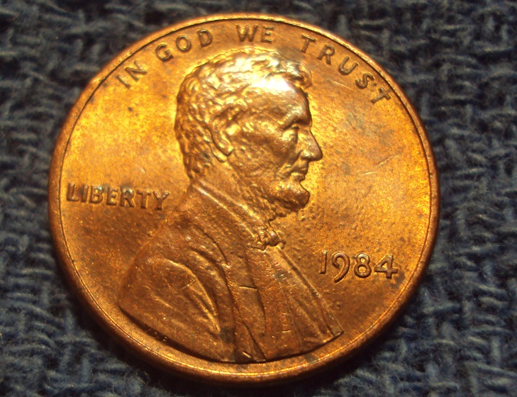 1984-LMC-WDDO-001-Doubled-Ear-Found-In-Bank-Rolled-Cents.