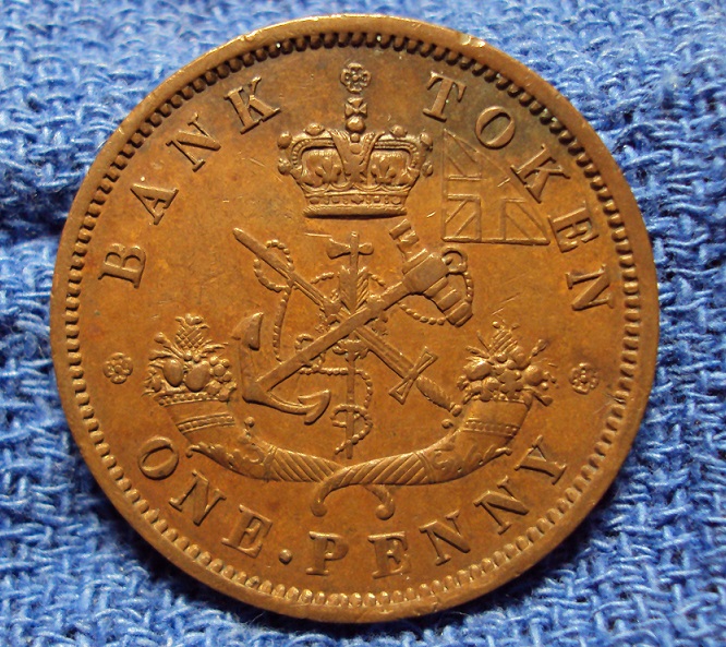 1854-Bank-Of-Upper-Canada-One-Penny-Bank-Token,-Looking-For-A-Grade-Please.