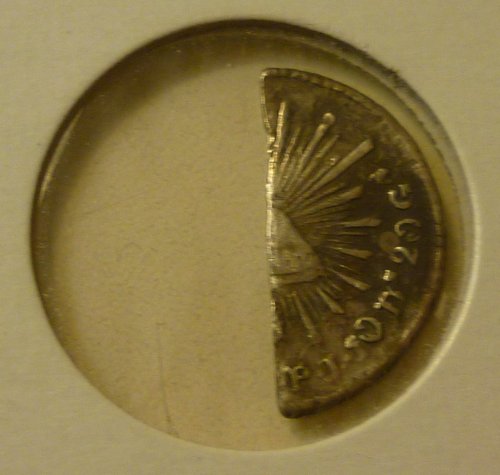 Value-Of-Silver-Coin-Cut-For-Change?