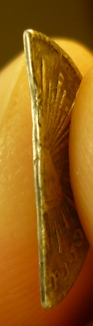 Value-Of-Silver-Coin-Cut-For-Change?