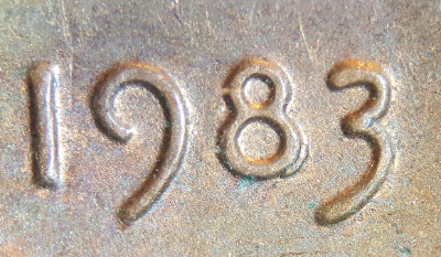 1983-P.-Is-It-Just-A-Die-Chip-On-The-8?