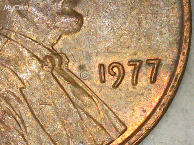 1977-P-LMC-Odd-Circle-On-Obverse.-What-Is-It-?