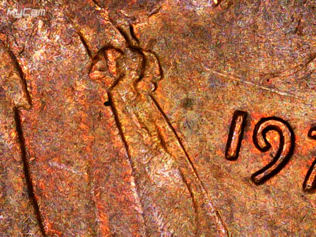 1977-P-LMC-Odd-Circle-On-Obverse.-What-Is-It-?