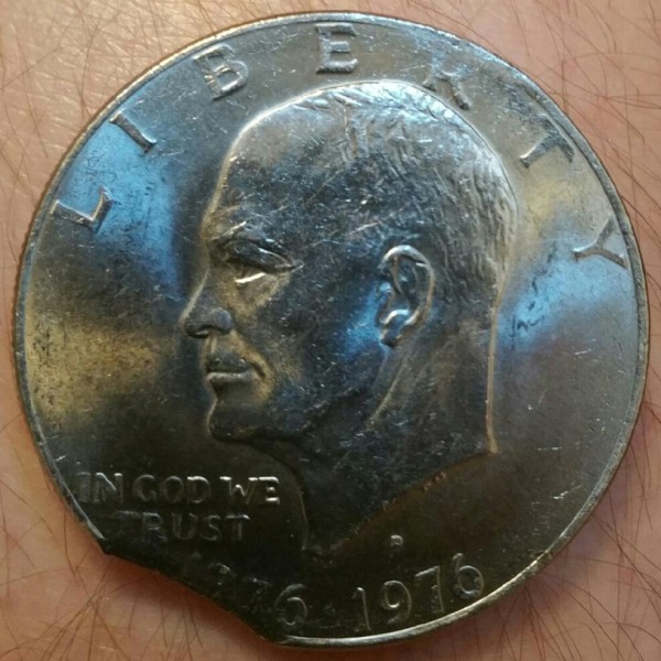 1976-Ike.-Clipped+Die-Deterioration-And/Or-Grease-Error
