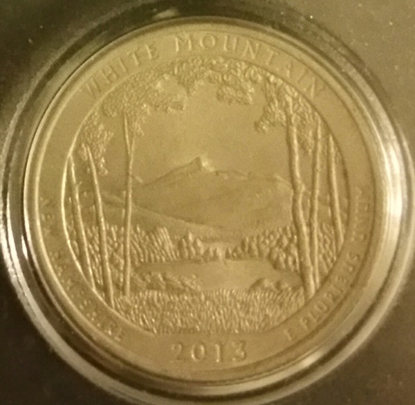 Odd-Surface-For-2013-State-Quarter