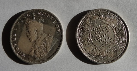 Effect-On-Grade---Square-Mark-From-Piece-Of-Paper-On-Coin