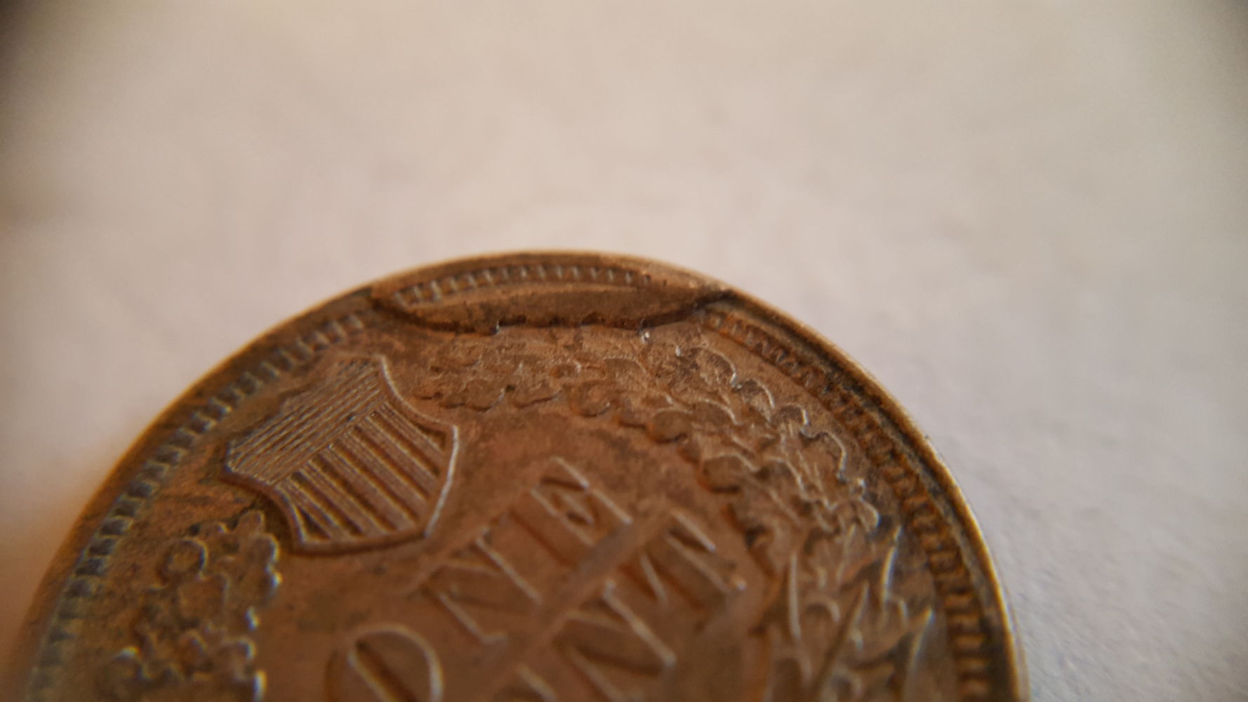 1863-IHC-With-A-Large-Cud-Or-Planchet-Flaw,-Not-Sure-What-Is-Going-On
