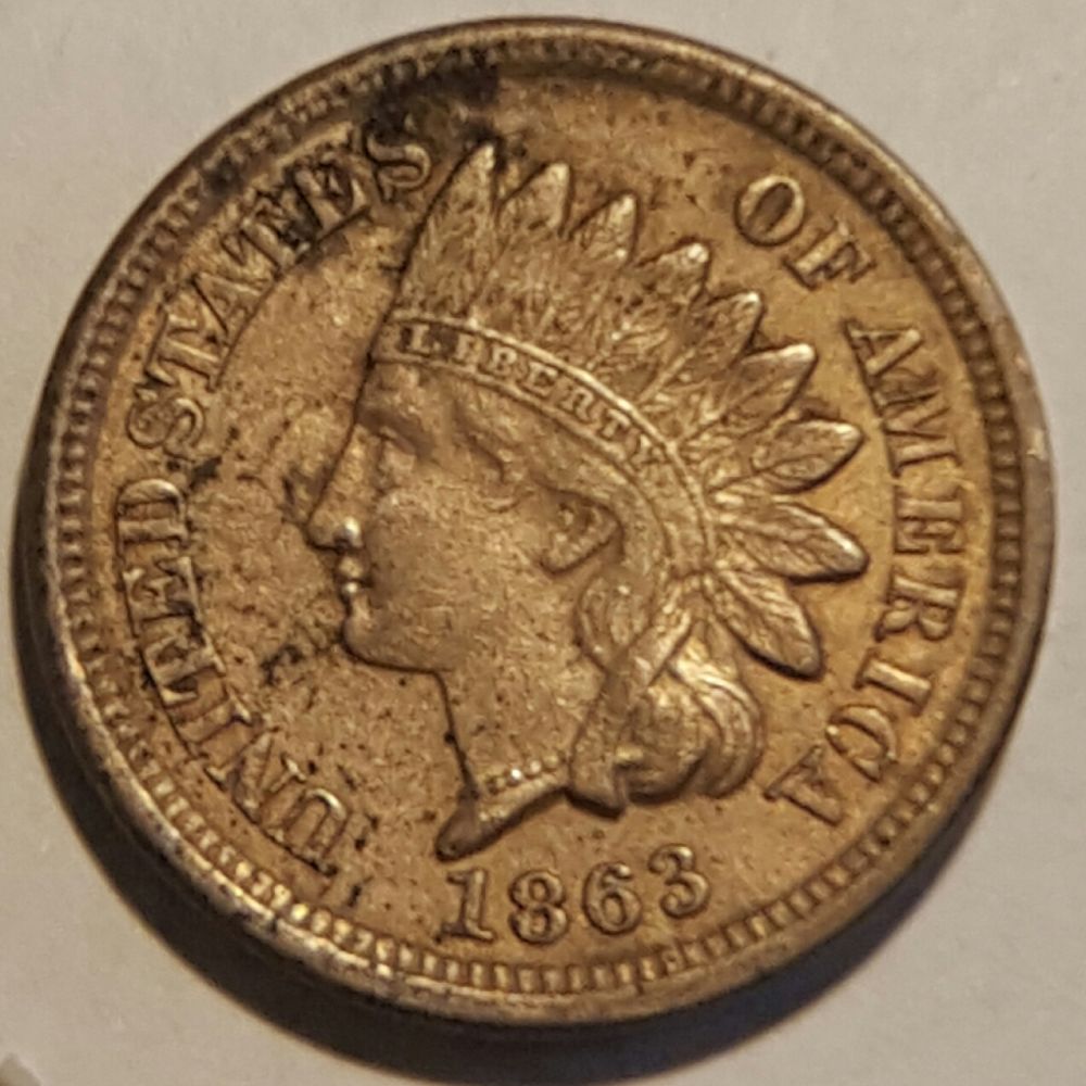 1863-IHC-With-A-Large-Cud-Or-Planchet-Flaw,-Not-Sure-What-Is-Going-On