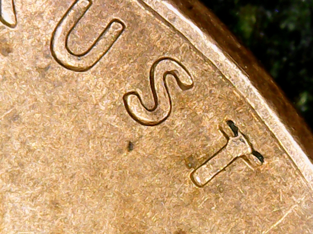 1998-Penny--Error?--This-Looks-Like-A-Mint-Error.-On-The-Top-Of-The-